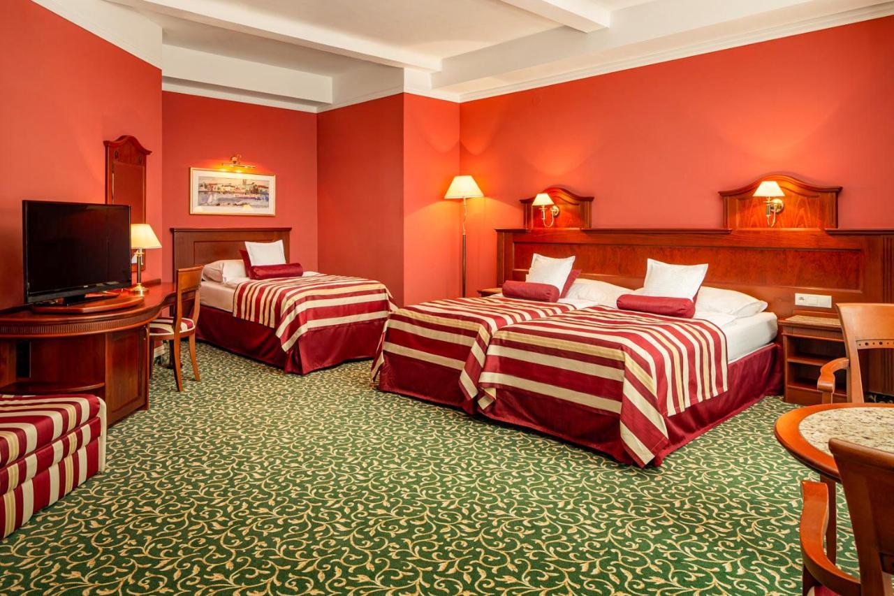 Superior Dreibettzimmer mit Zugang zum Wellness- und Fitnessbereich