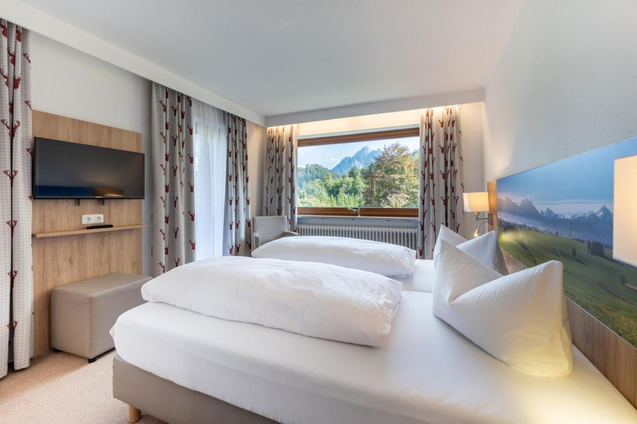 Dreibettzimmer mit Balkon