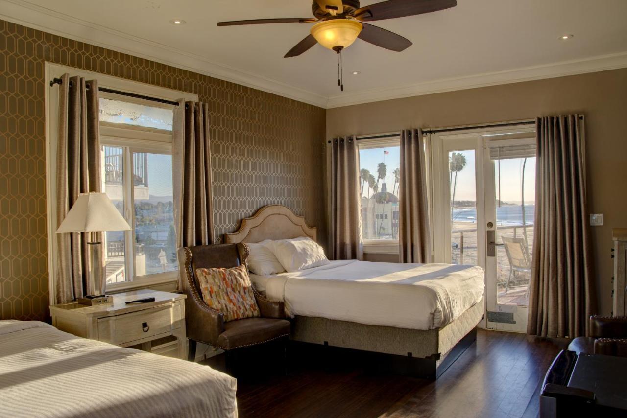 Partial Ocean View Two Queen Beds Shared Patio
