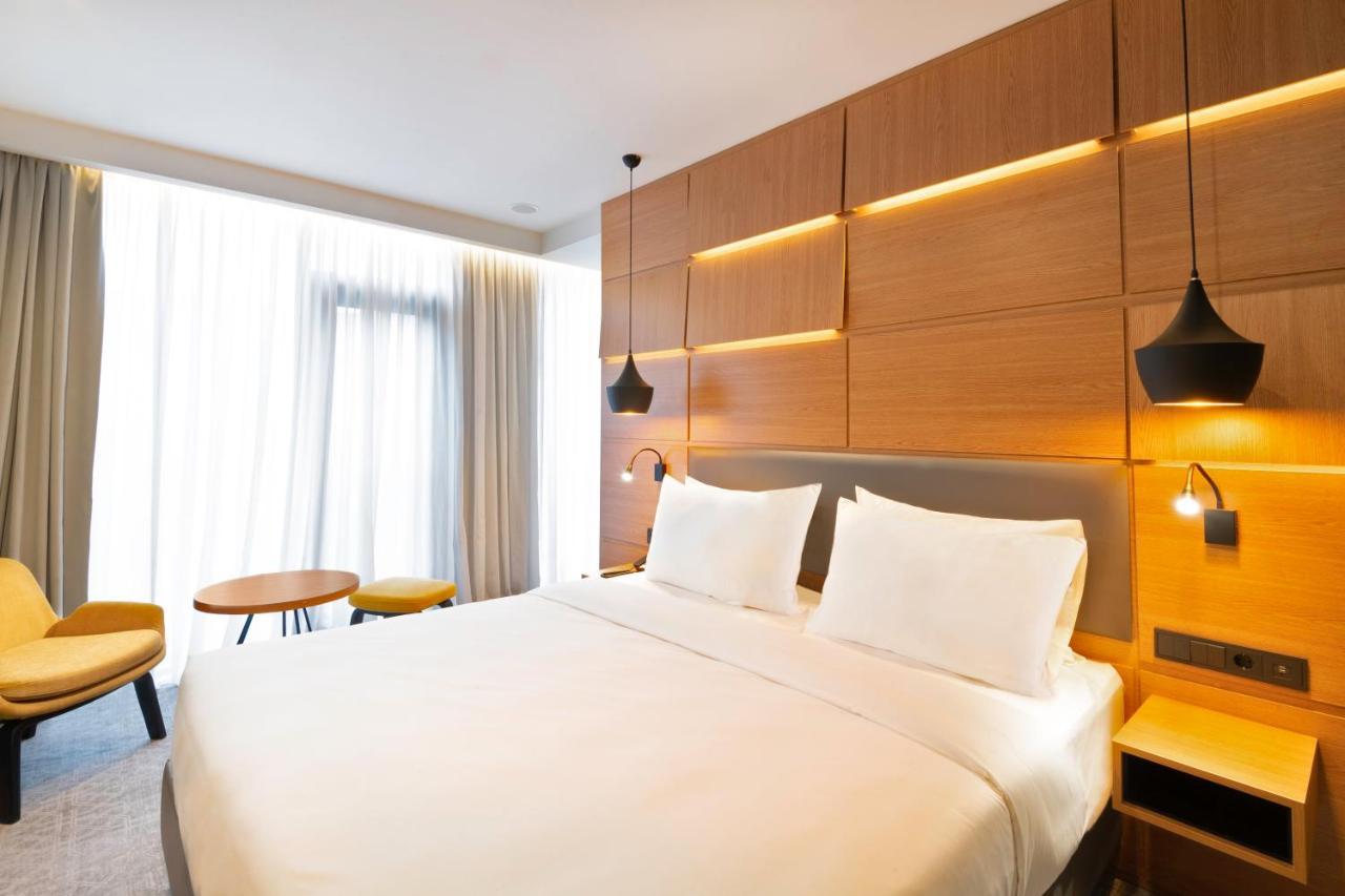 Suite mit 1 Schlafzimmer mit Kingsize-Bett und Zugang zur Terrasse