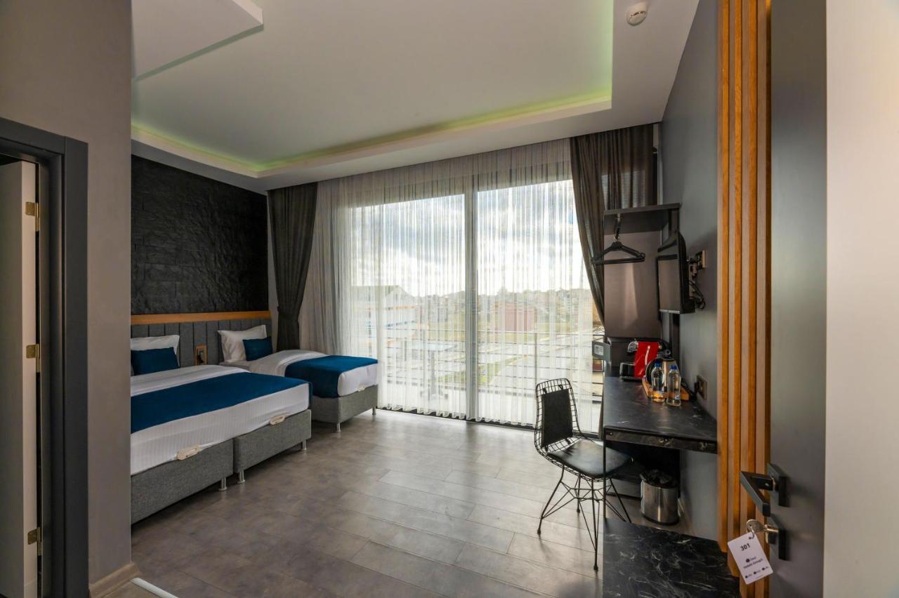 Deluxe Dreibettzimmer