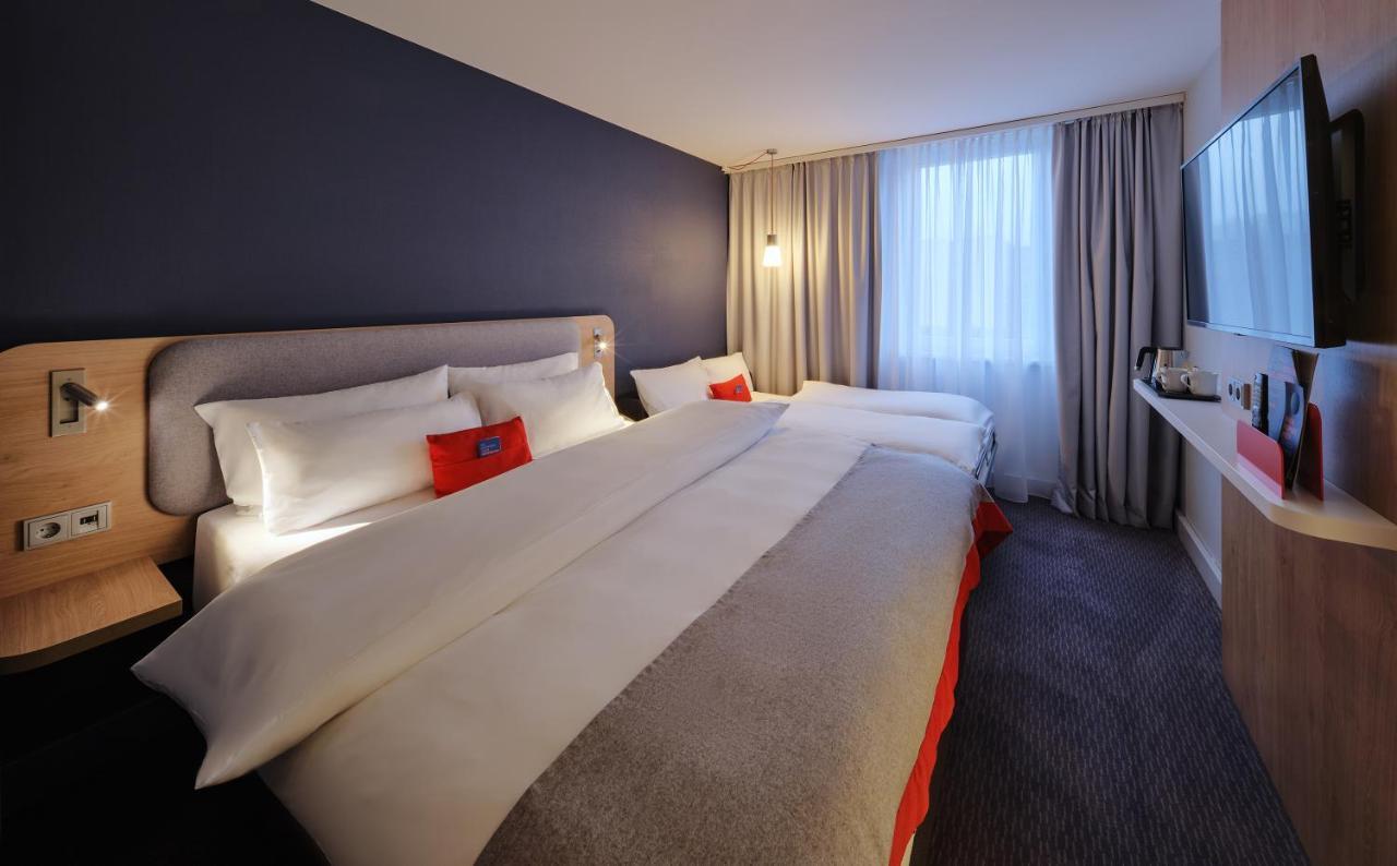 Standard Zimmer mit Queensize-Bett und Einzelschlafsofa