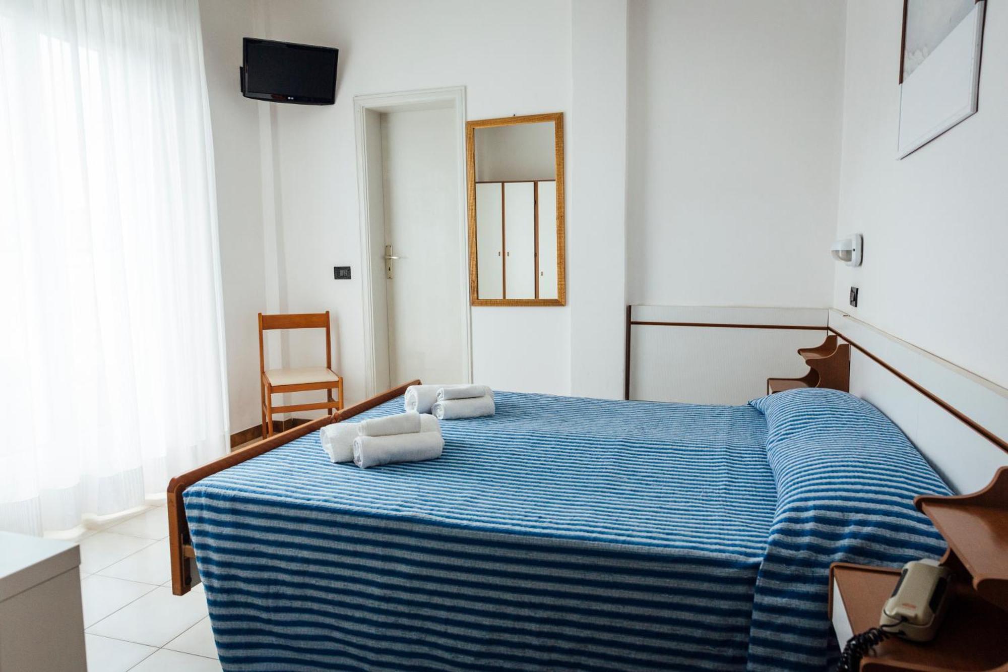 Doppel- oder Zweibettzimmer