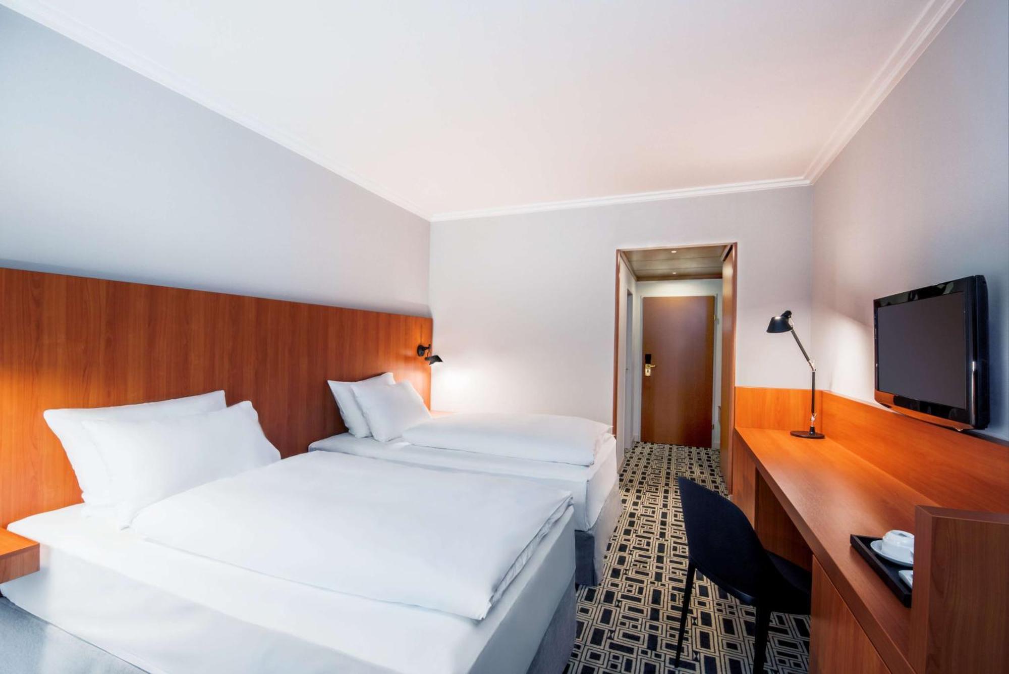 Standard Doppel-/Zweibettzimmer mit Zustellbett