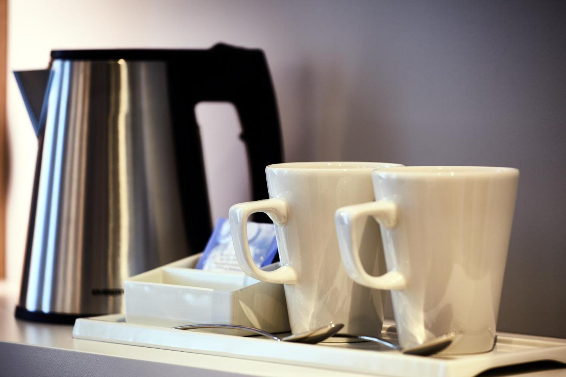 Standard Doppelzimmer mit Schlafsofa und Stadtblick