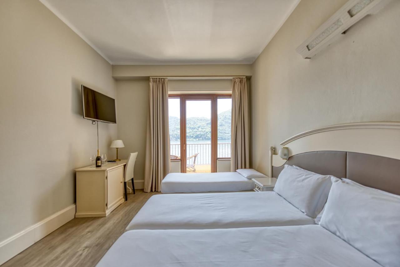 Dreibettzimmer mit Seeblick und Balkon