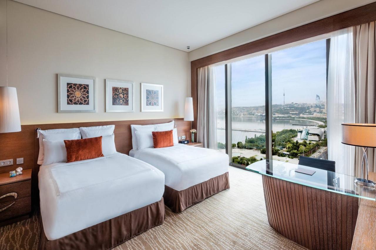 Deluxe Zimmer mit 2 Doppelbetten und Meerblick