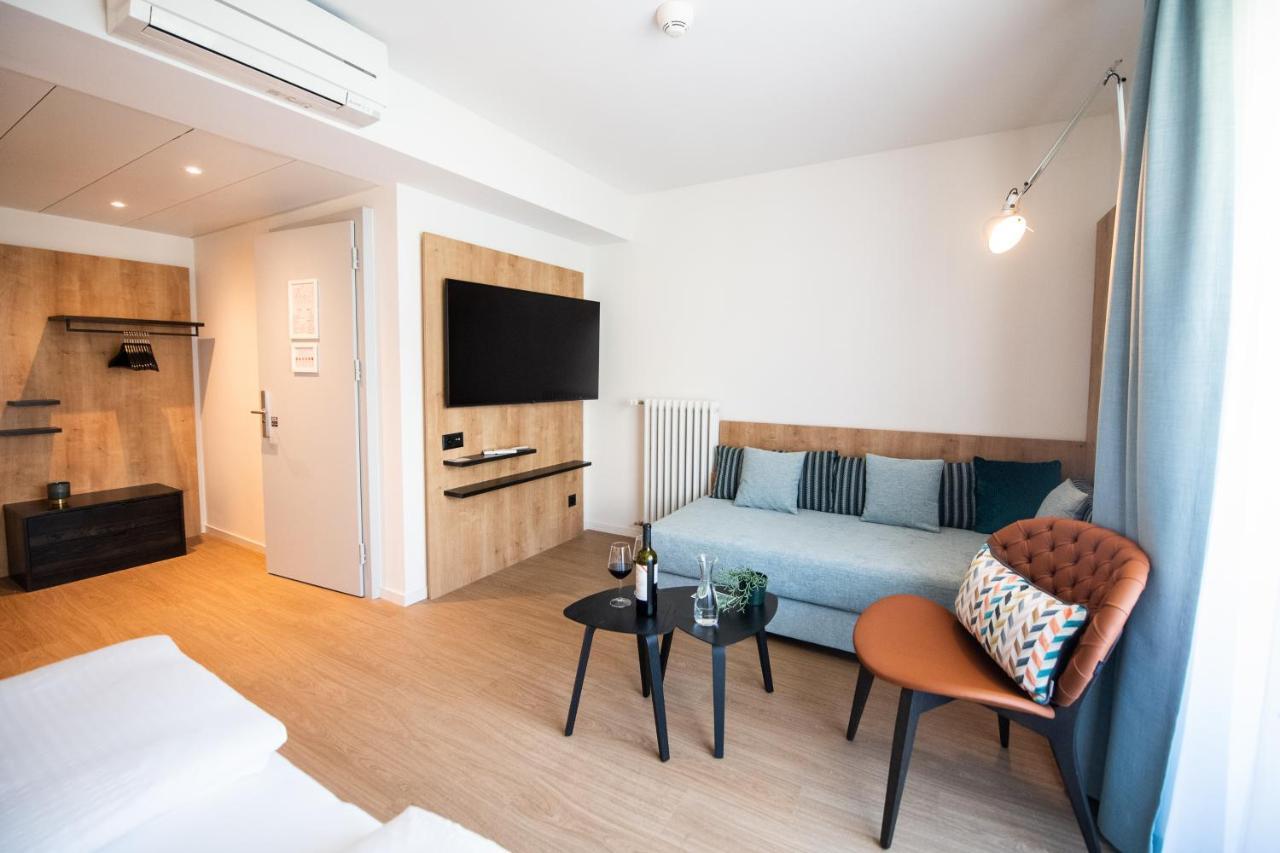 Dreibettzimmer mit Balkon