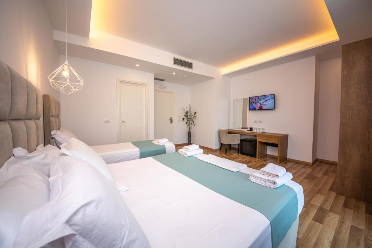 Deluxe Dreibettzimmer mit Balkon