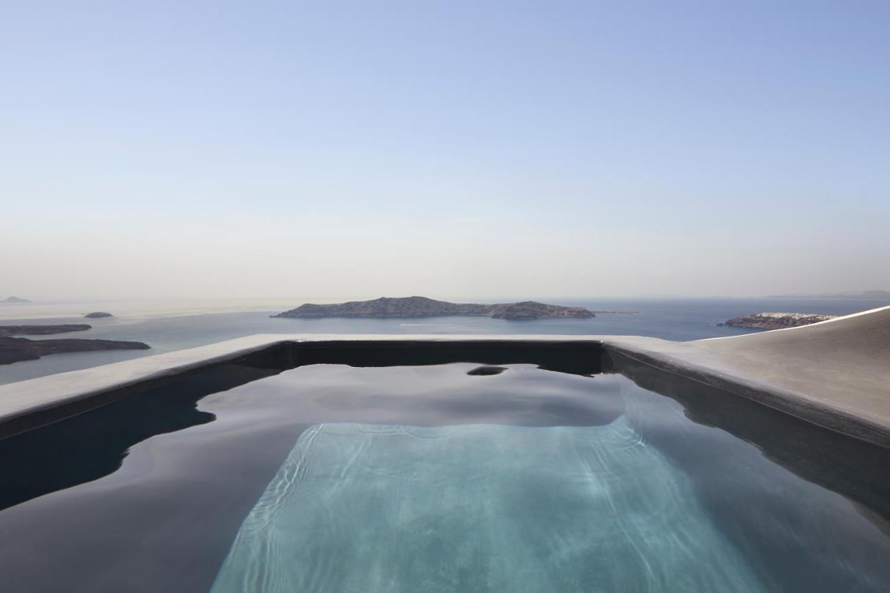Suite Mystic mit Blick auf den Sonnenuntergang, beheiztem Tauchbecken und Innenpool