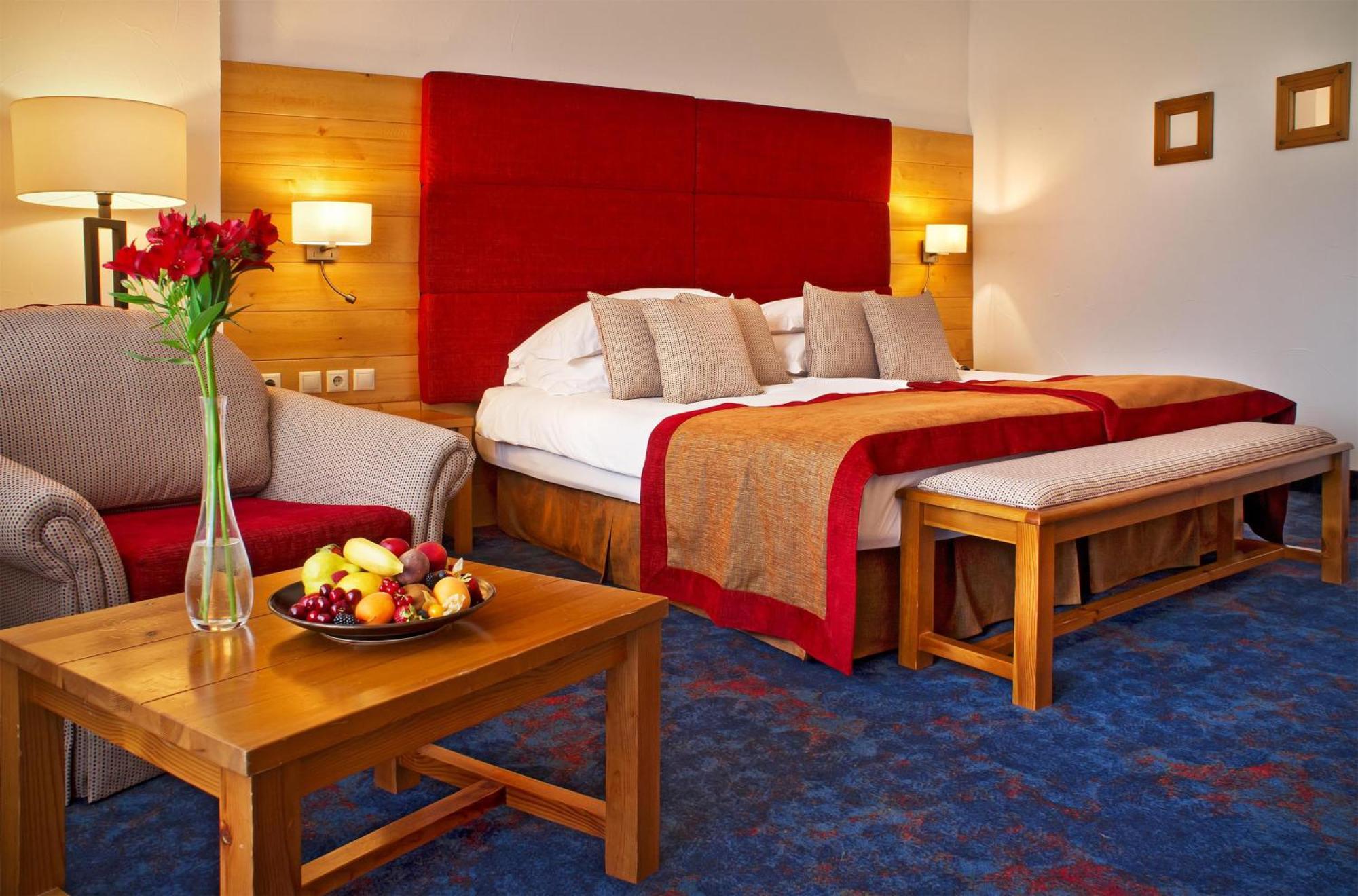 Deluxe Zimmer mit Kingsize-Bett und Bergblick