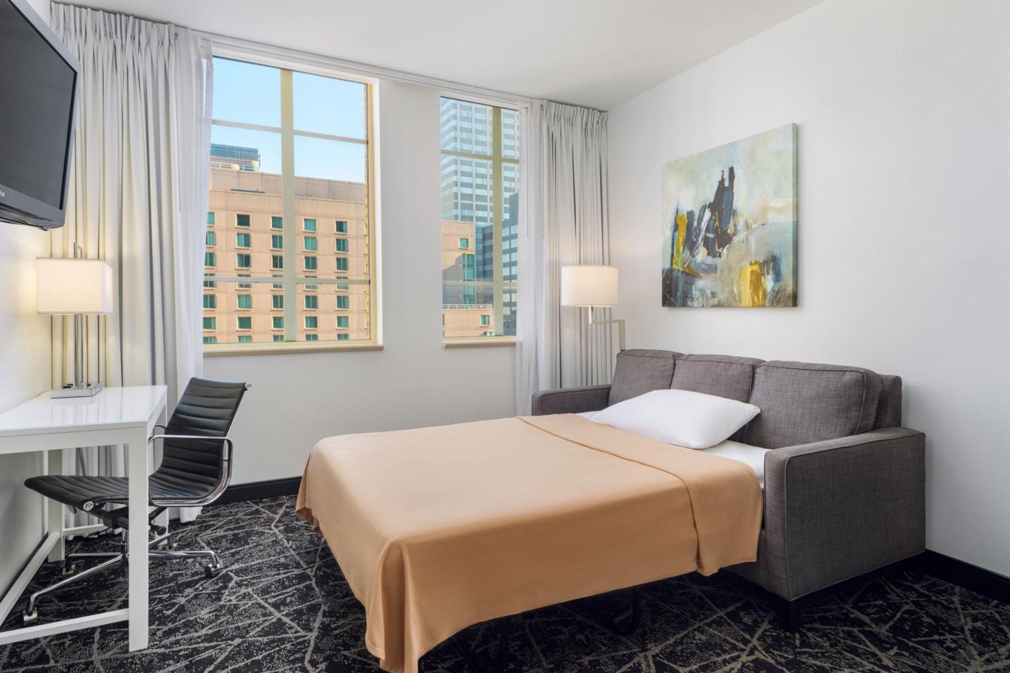 Suite mit 1 Schlafzimmer mit Kingsize-Bett mit Schlafsofa