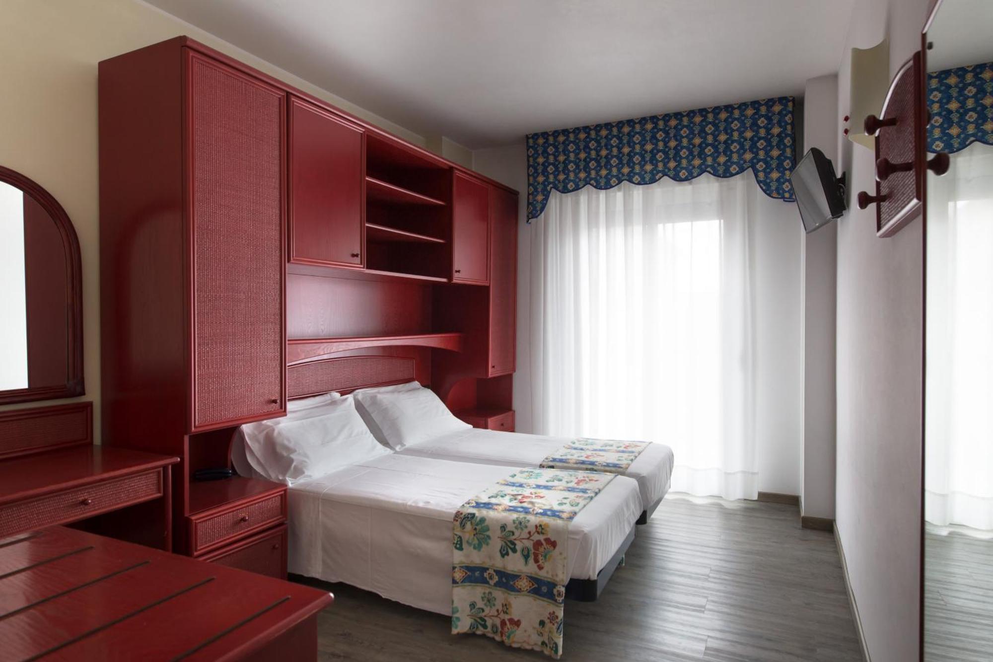 Doppel- oder Zweibettzimmer