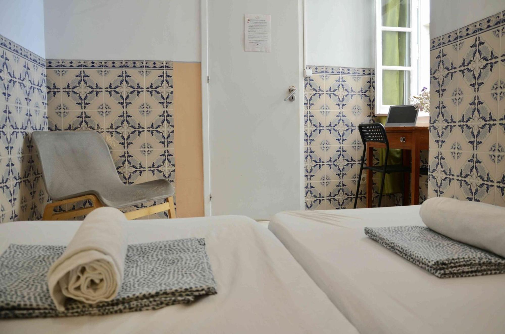 Doppel- oder Zweibettzimmer