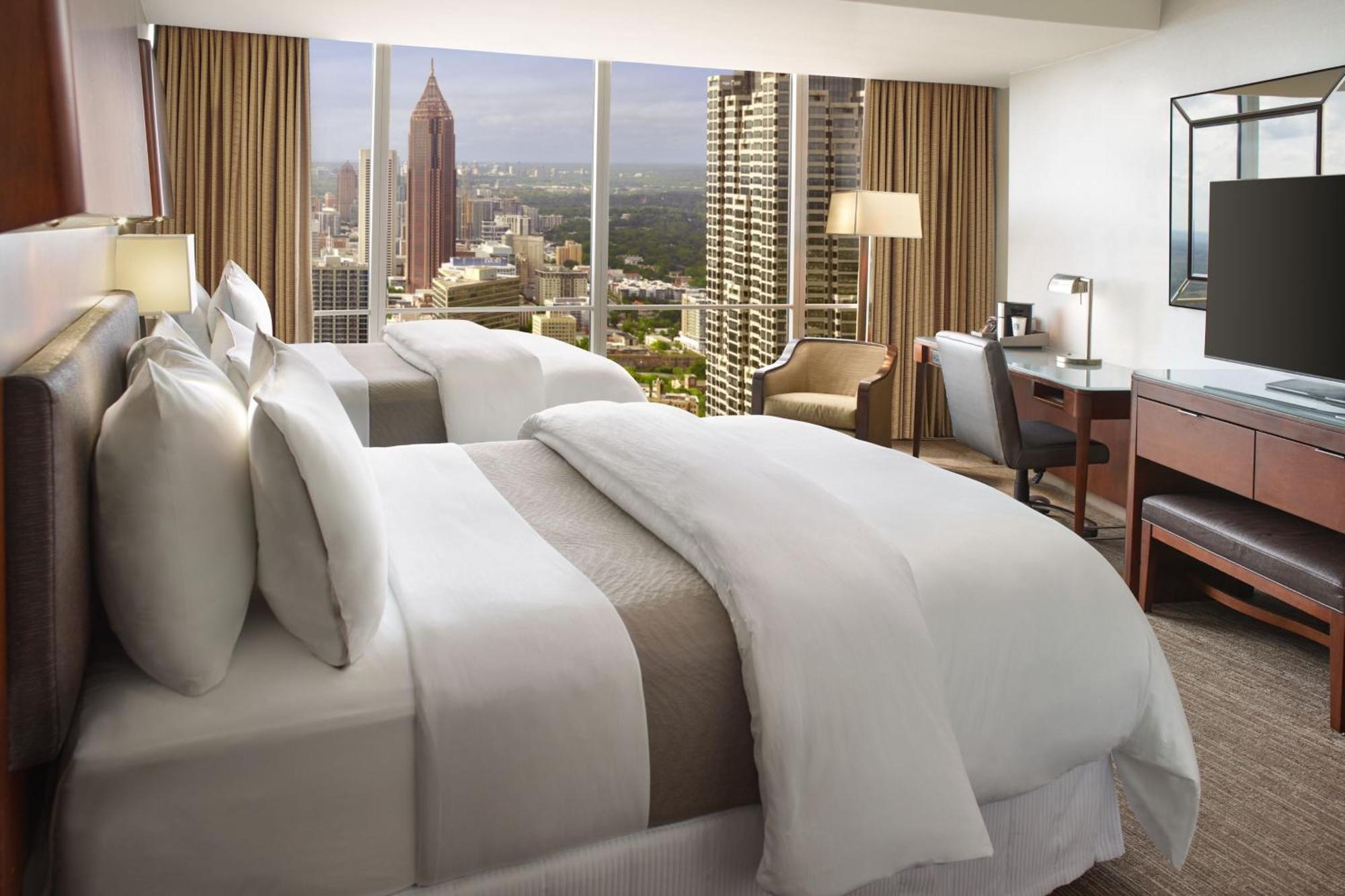 Zimmer mit 1 Queensize-Bett und Schlafsofa - Blick auf die Skyline - obere Etage