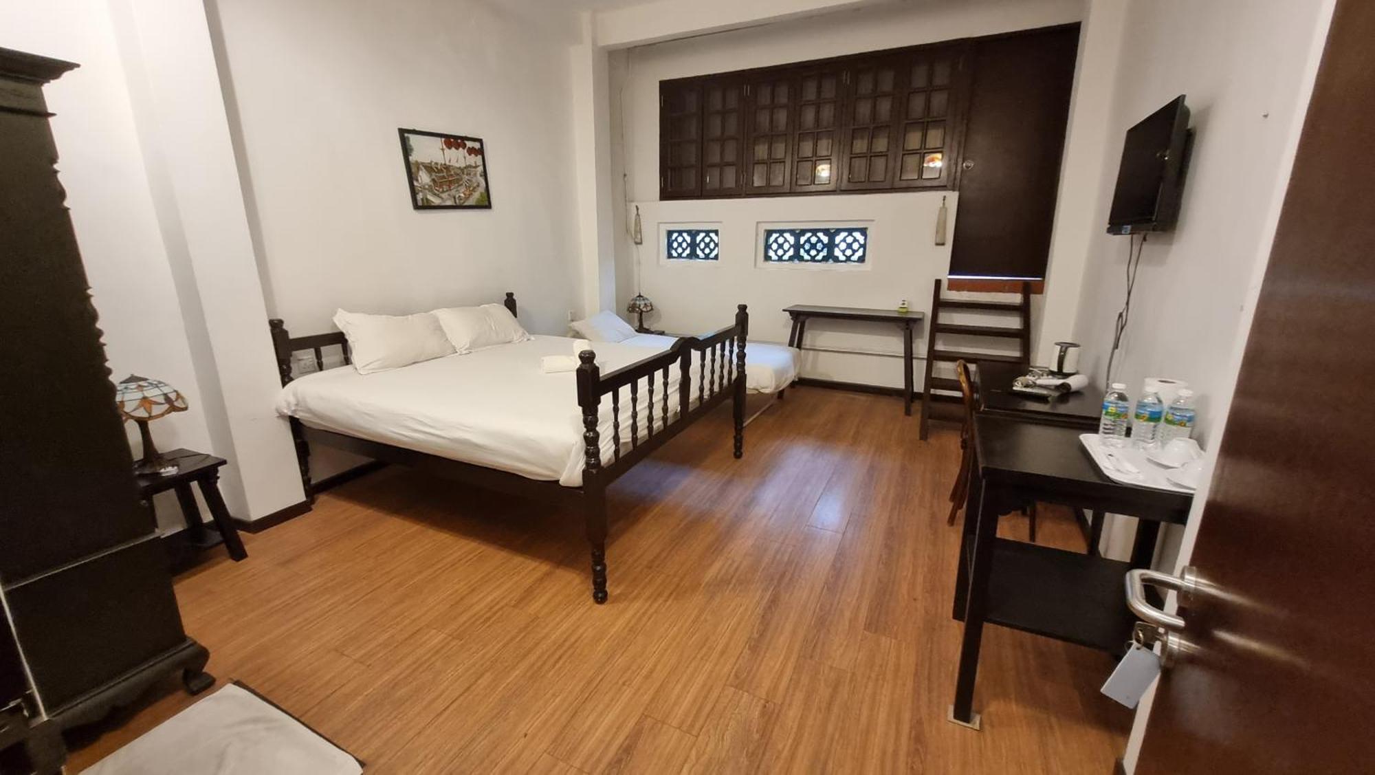 Dreibettzimmer mit Seeblick