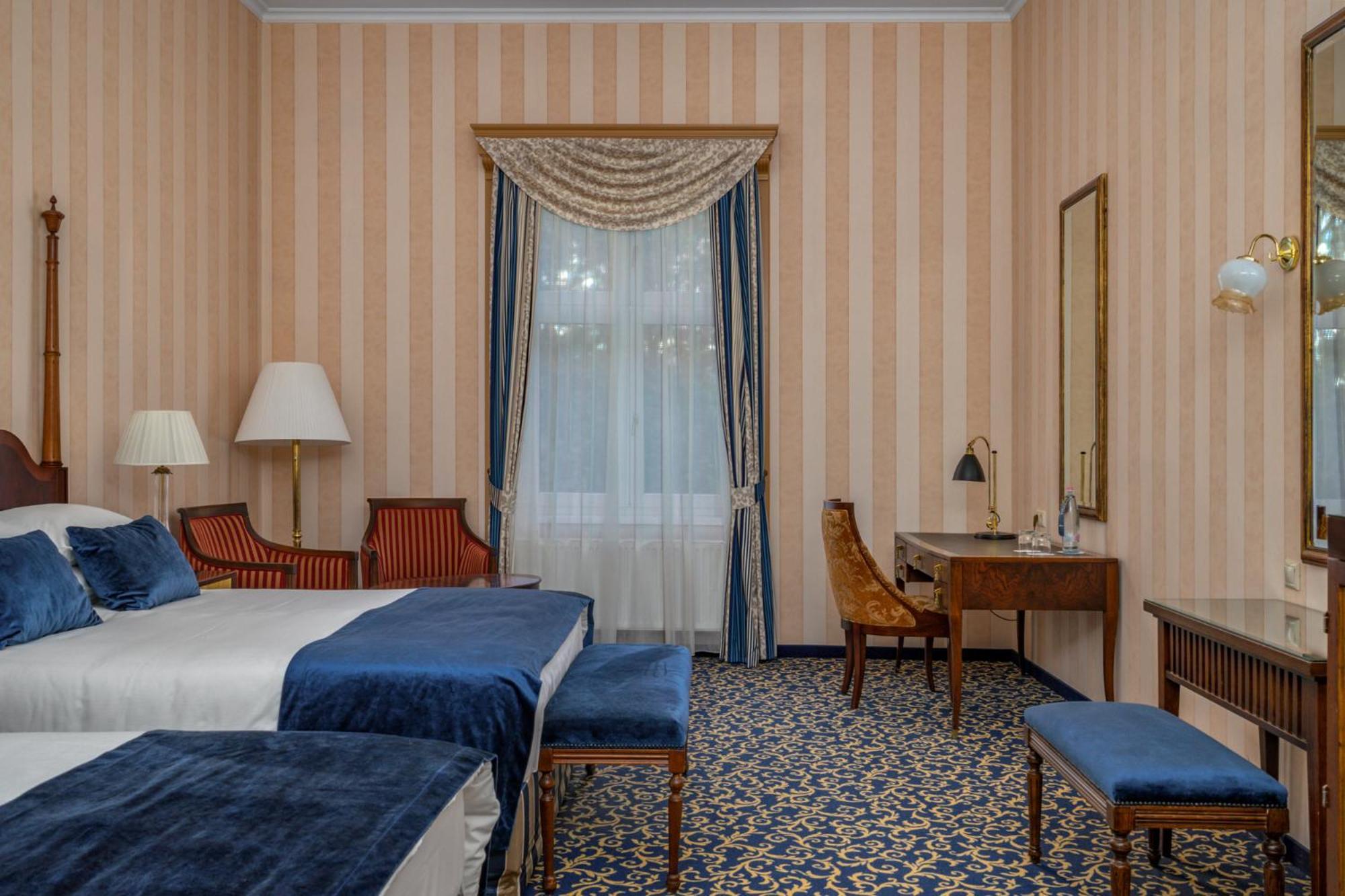 Deluxe Familienzimmer mit Zugang zum Wellness- und Fitnessbereich