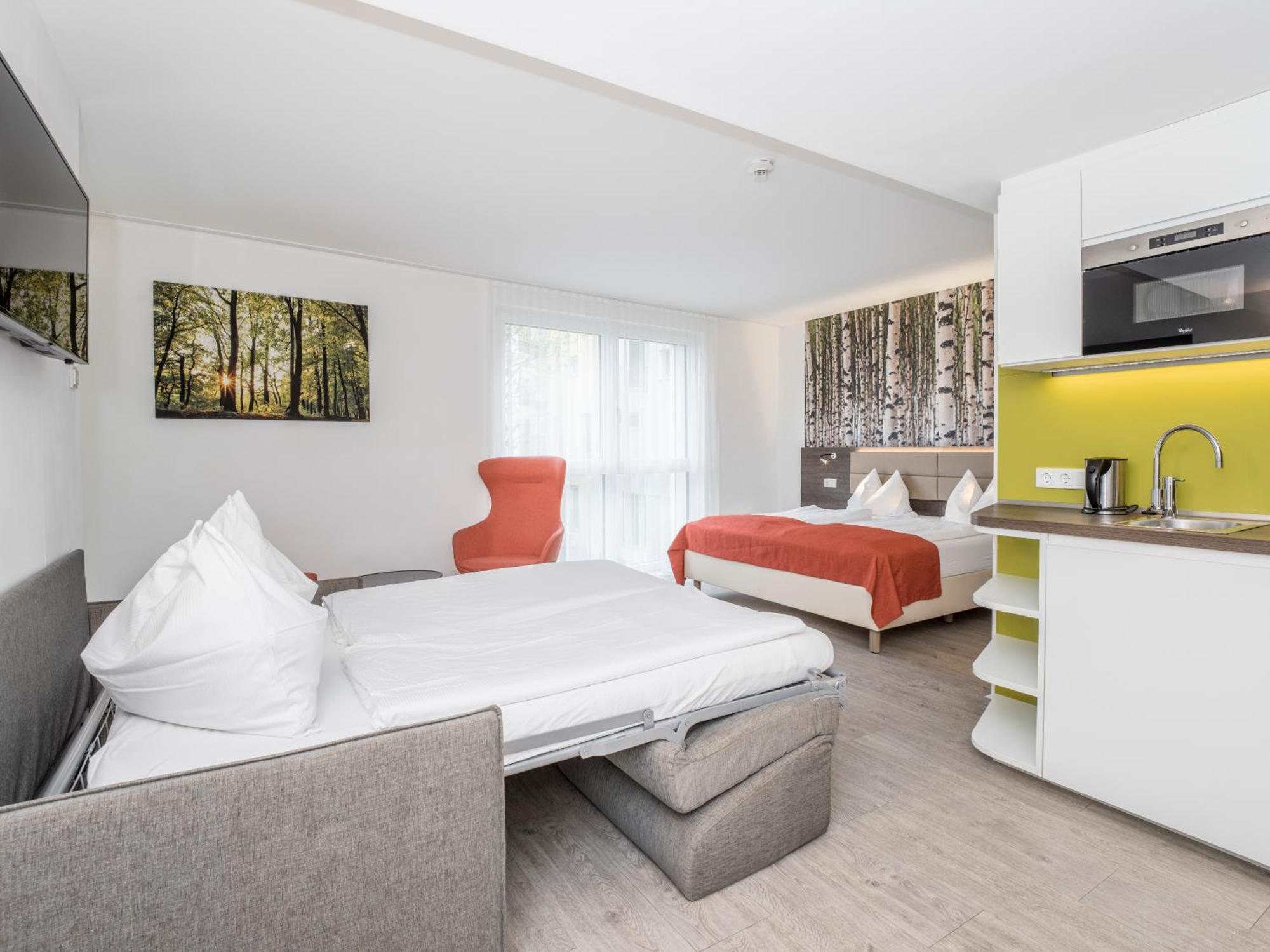 Deluxe Doppel-/Zweibettzimmer mit Balkon