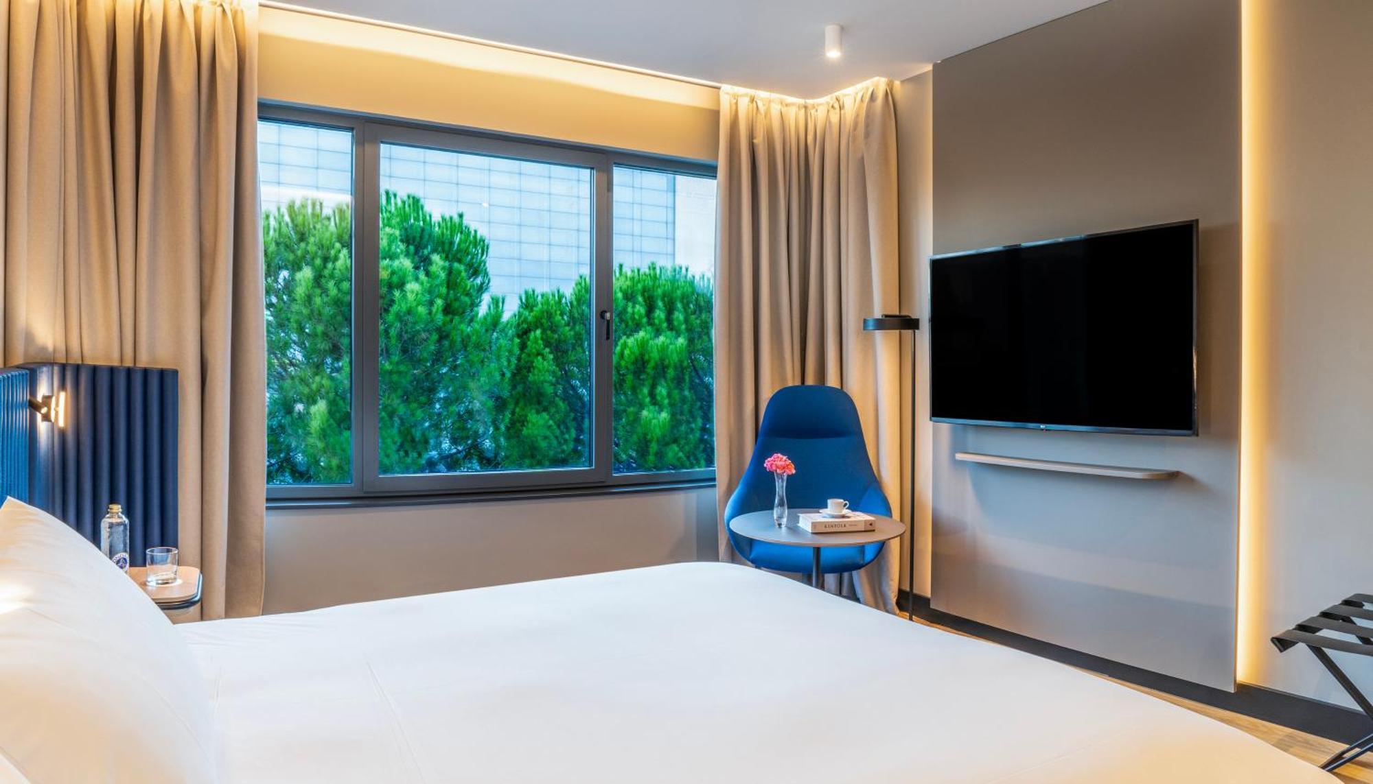 Executive Zimmer mit 1 Doppelbett und 1 Sofa