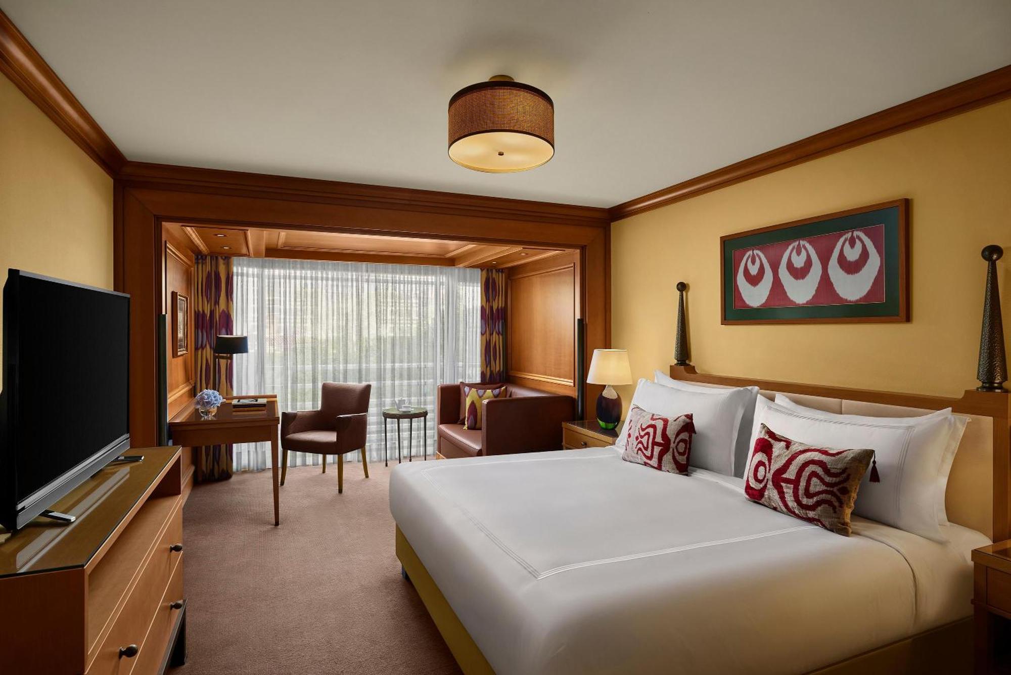 Deluxe Zimmer mit Kingsize-Bett und Parkblick