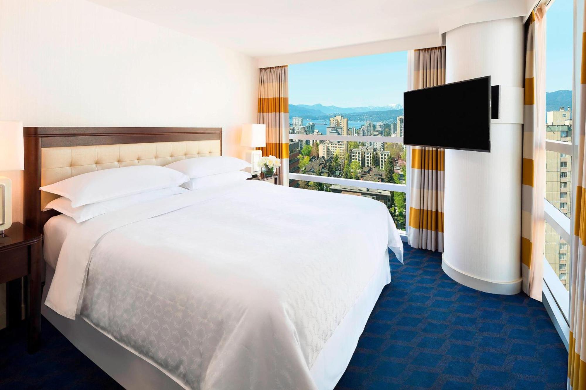 Familienzimmer mit 1 Kingsize-Bett und 2 Doppelbetten