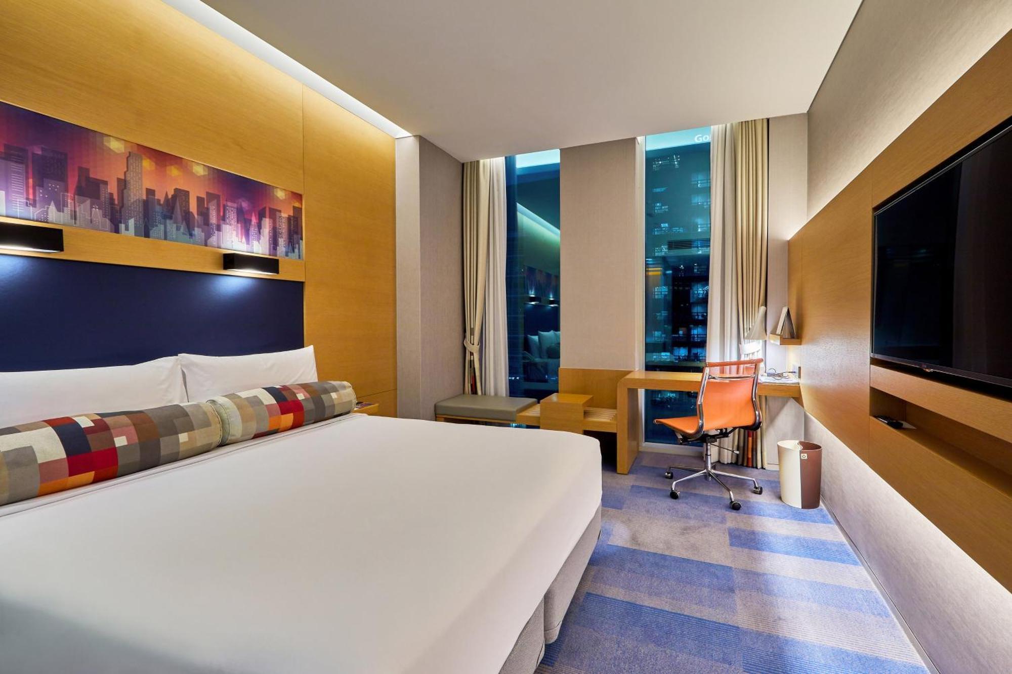 Zimmer Urban Chic Hollywood mit 1 Kingsize-Bett und Stadtblick