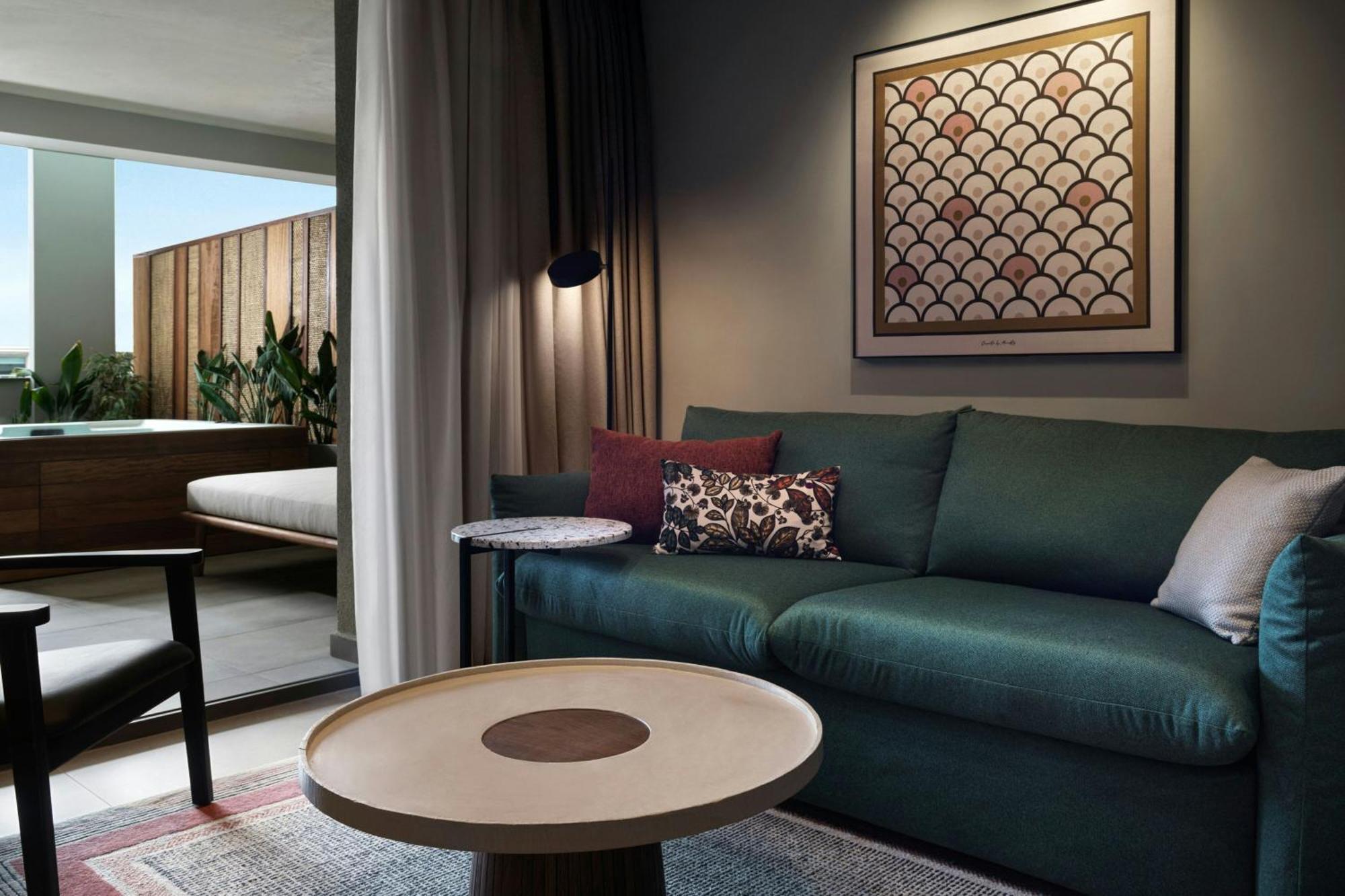 Junior Suite mit Balkon und Gartenblick