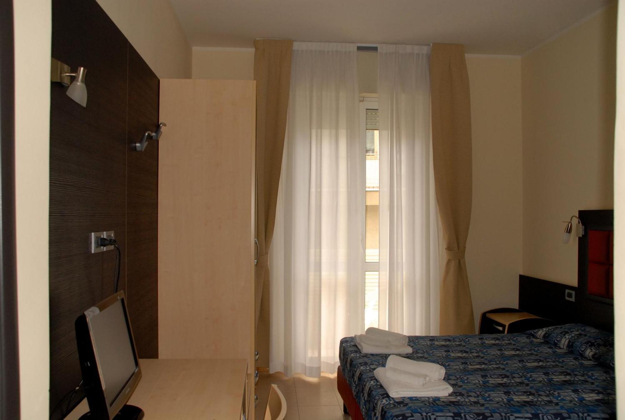 Dreibettzimmer mit Balkon