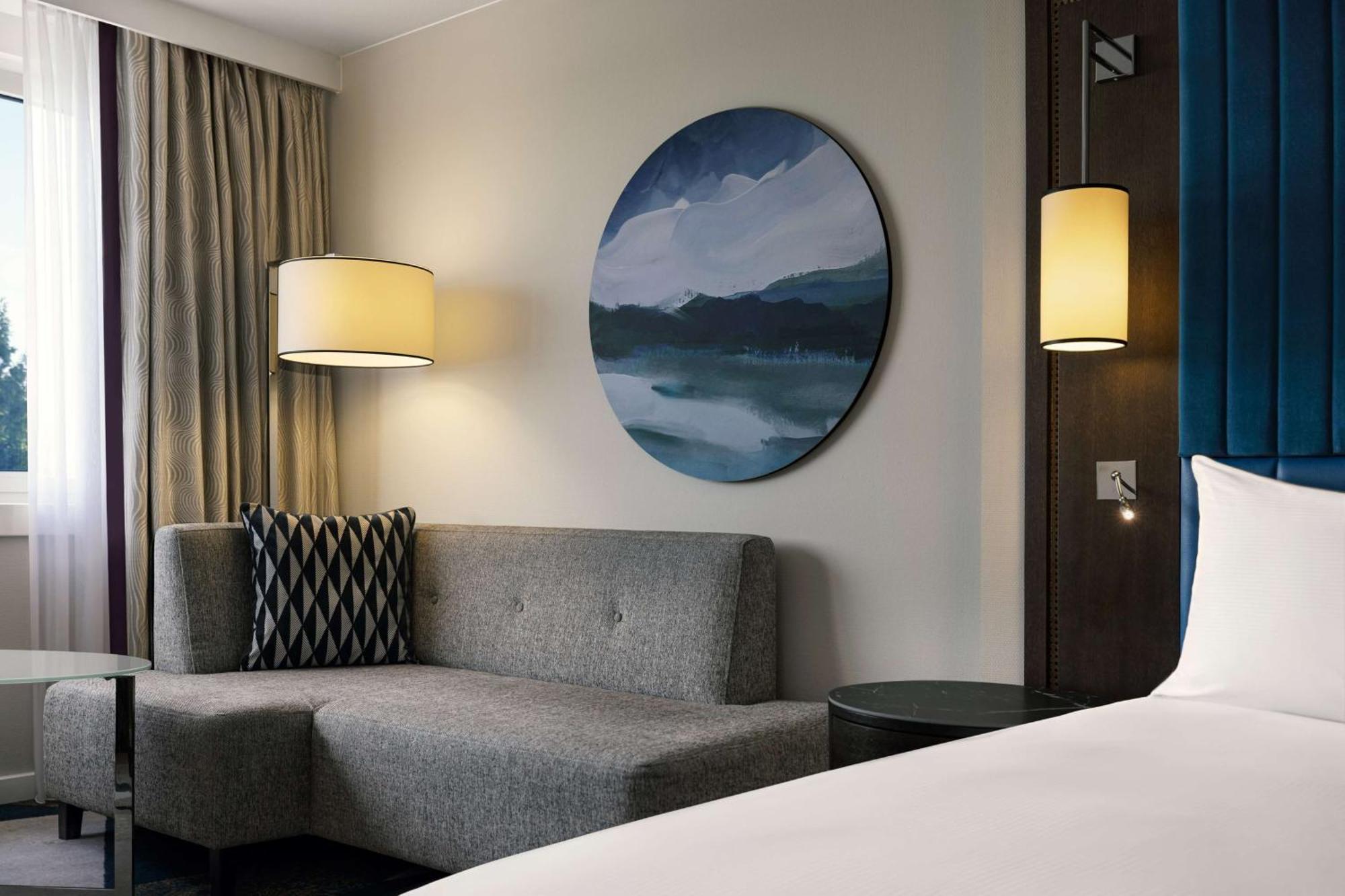 Zimmer mit 2 Queensize-Betten zur Wasserseite