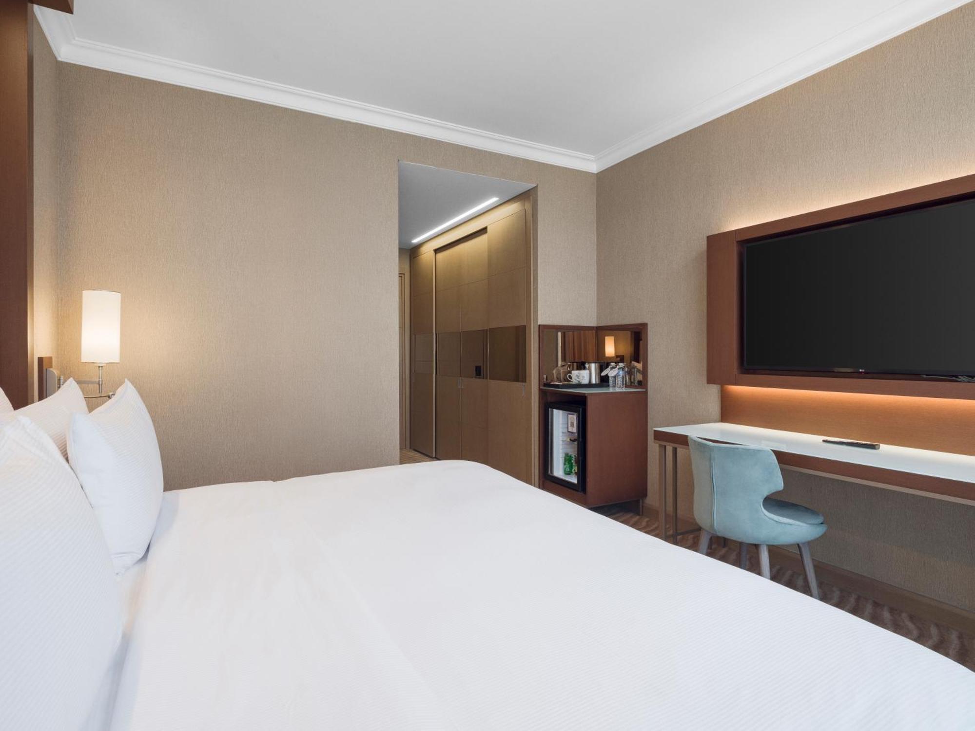 Executive Premium Zimmer mit Kingsize-Bett und Meerblick