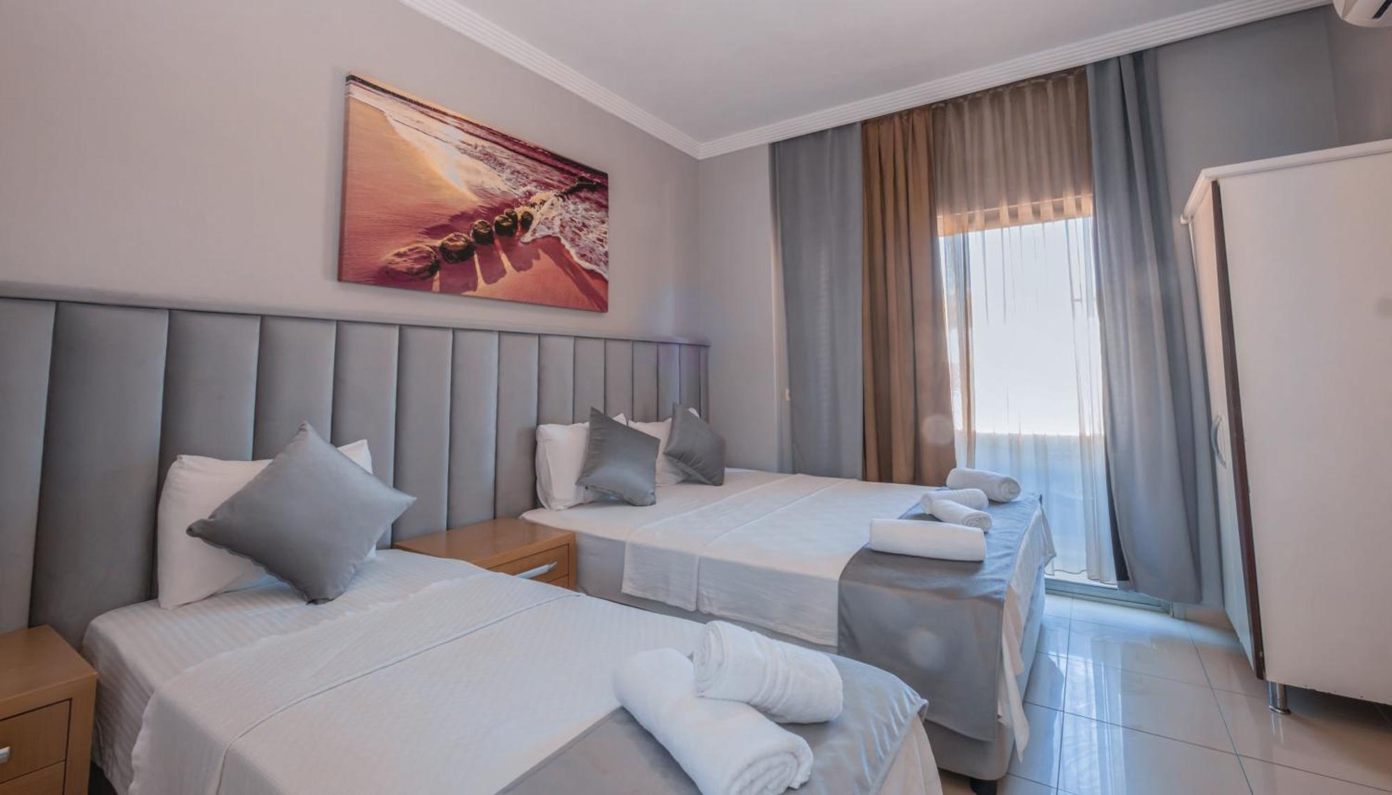 Dreibettzimmer mit Balkon