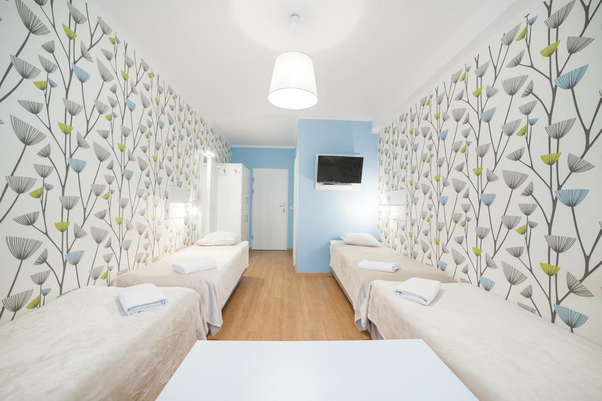 Deluxe Vierbettzimmer mit eigenem Bad