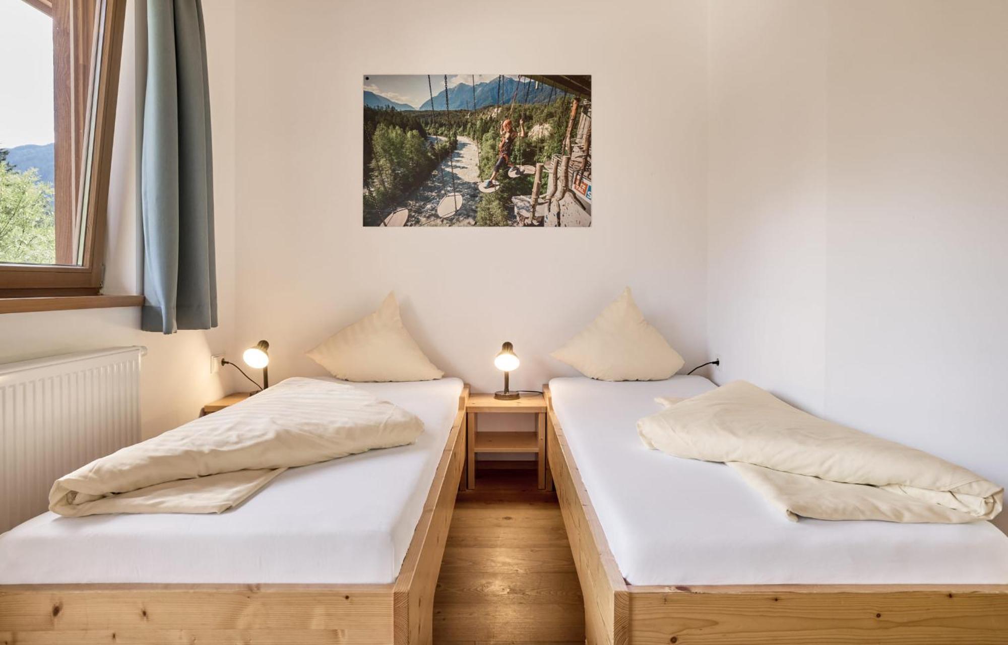 Dreibettzimmer mit Bergblick