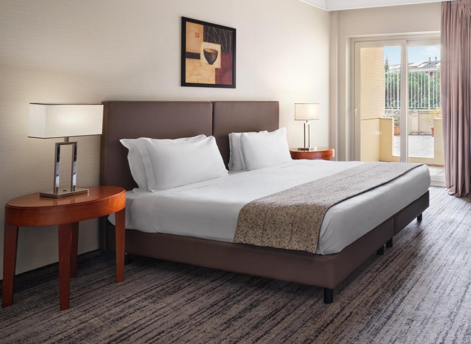 Junior Suite mit Kingsize-Bett und 2 Einzelbetten