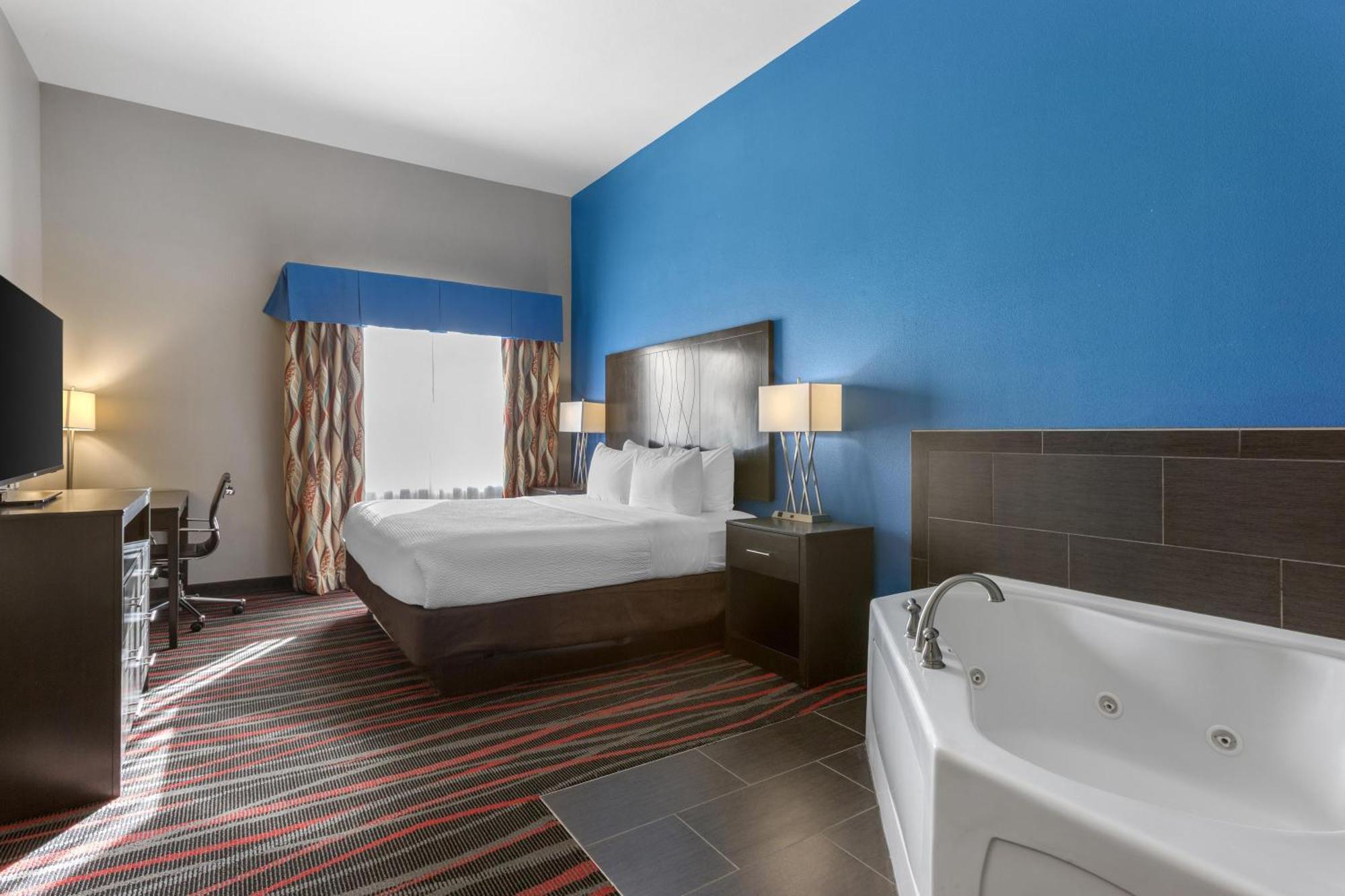 Suite mit Kingsize-Bett und Whirlpool - Nichtraucher