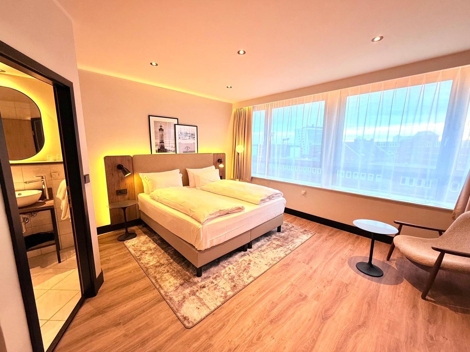 Superior Zimmer mit 1 Queensize-Bett und 2 Einzelbetten