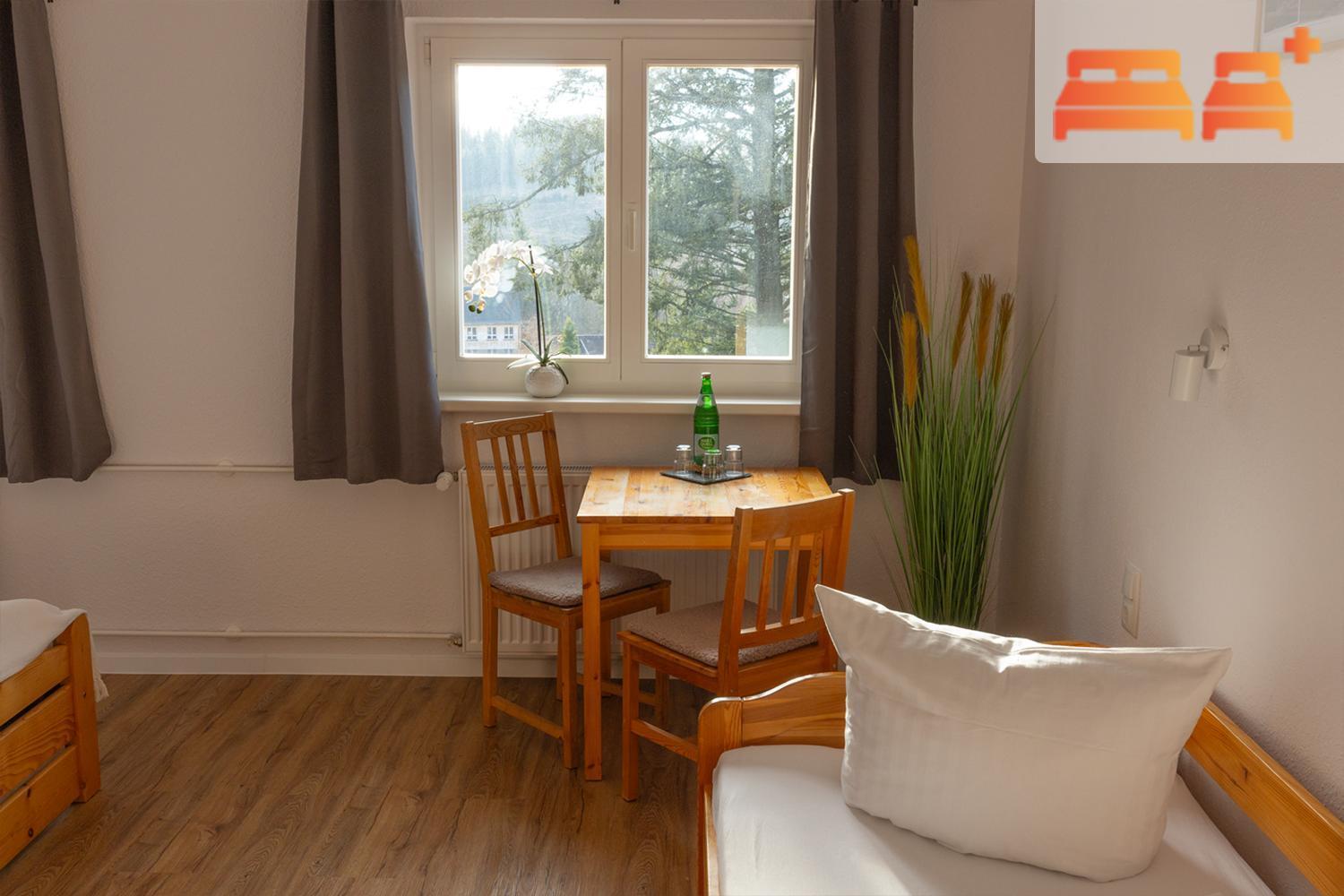 Familienzimmer mit Gemeinschaftsbad