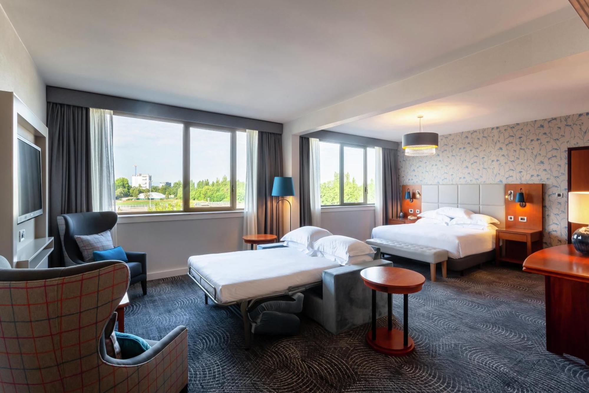 Deluxe Zimmer mit Kingsize-Bett und Schlafsofa