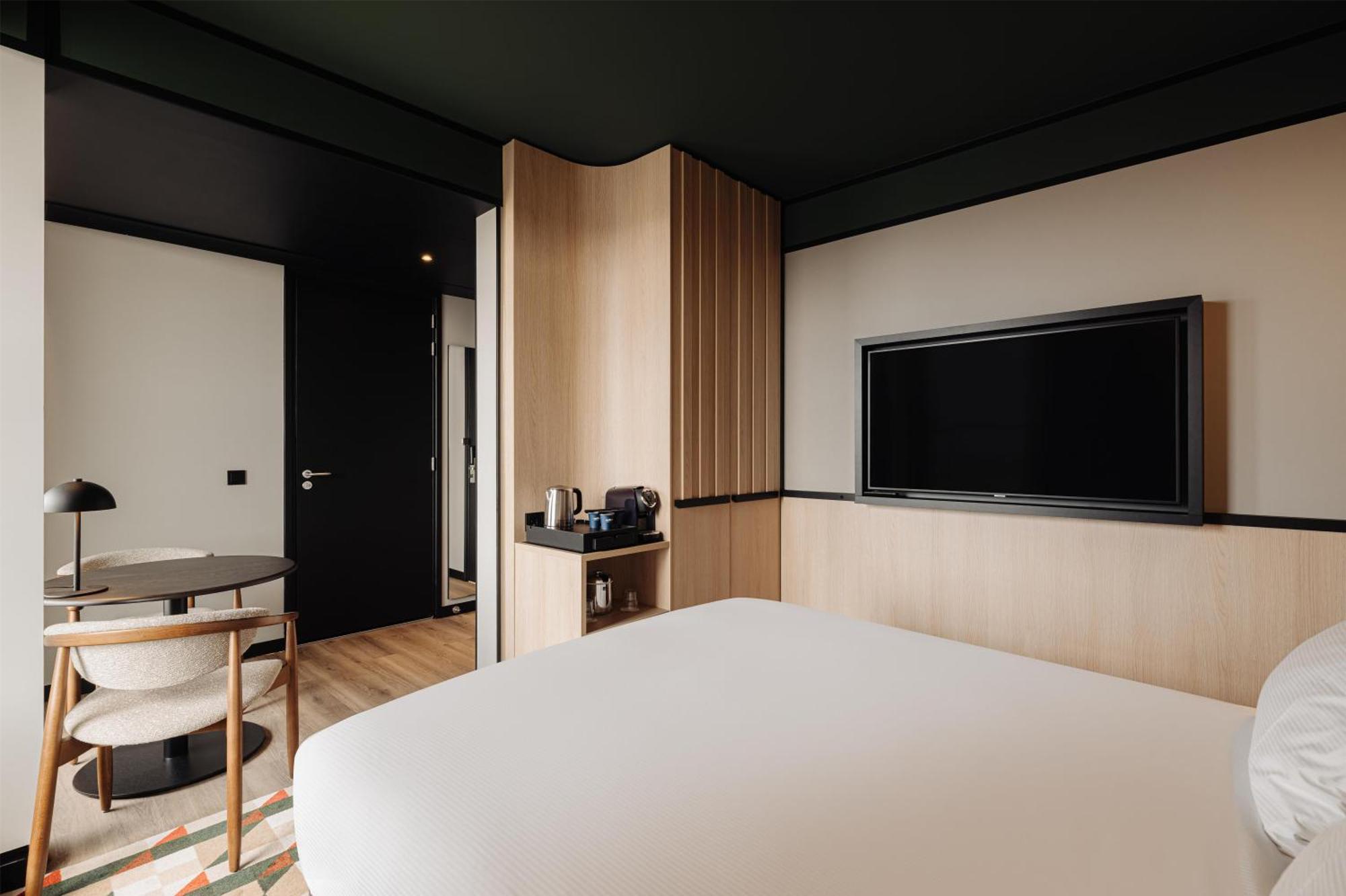 Deluxe Zimmer mit Balkon und Stadtblick
