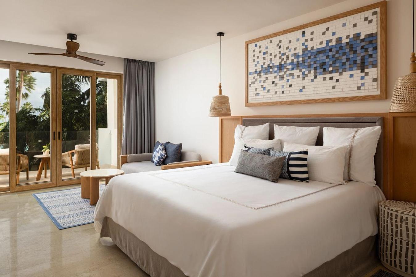 Junior Suite mit Kingsize-Bett und Gartenblick