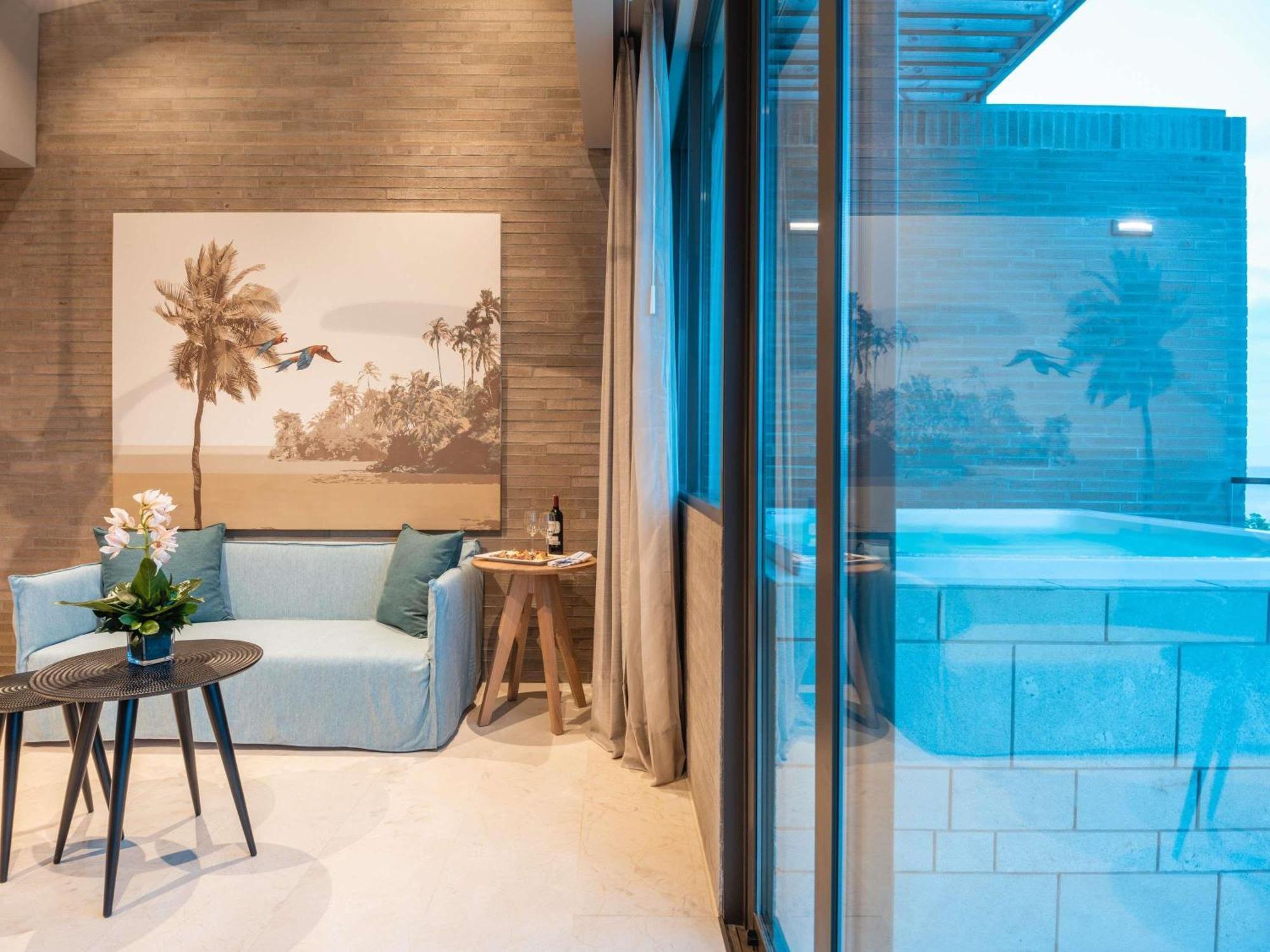 Karibisches Penthouse für Familien mit 2 Schlafzimmern, 1 Kingsize-Bett, 2 Einzelbetten und Meerblick