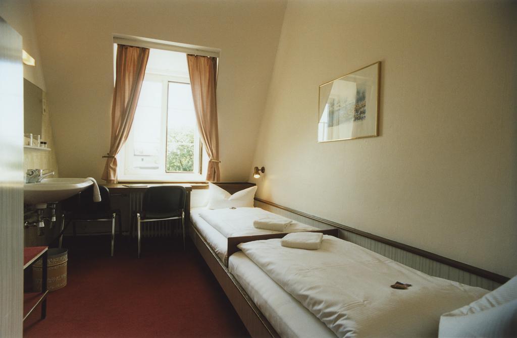 Basic Doppel-/Zweibettzimmer mit Gemeinschaftsbad