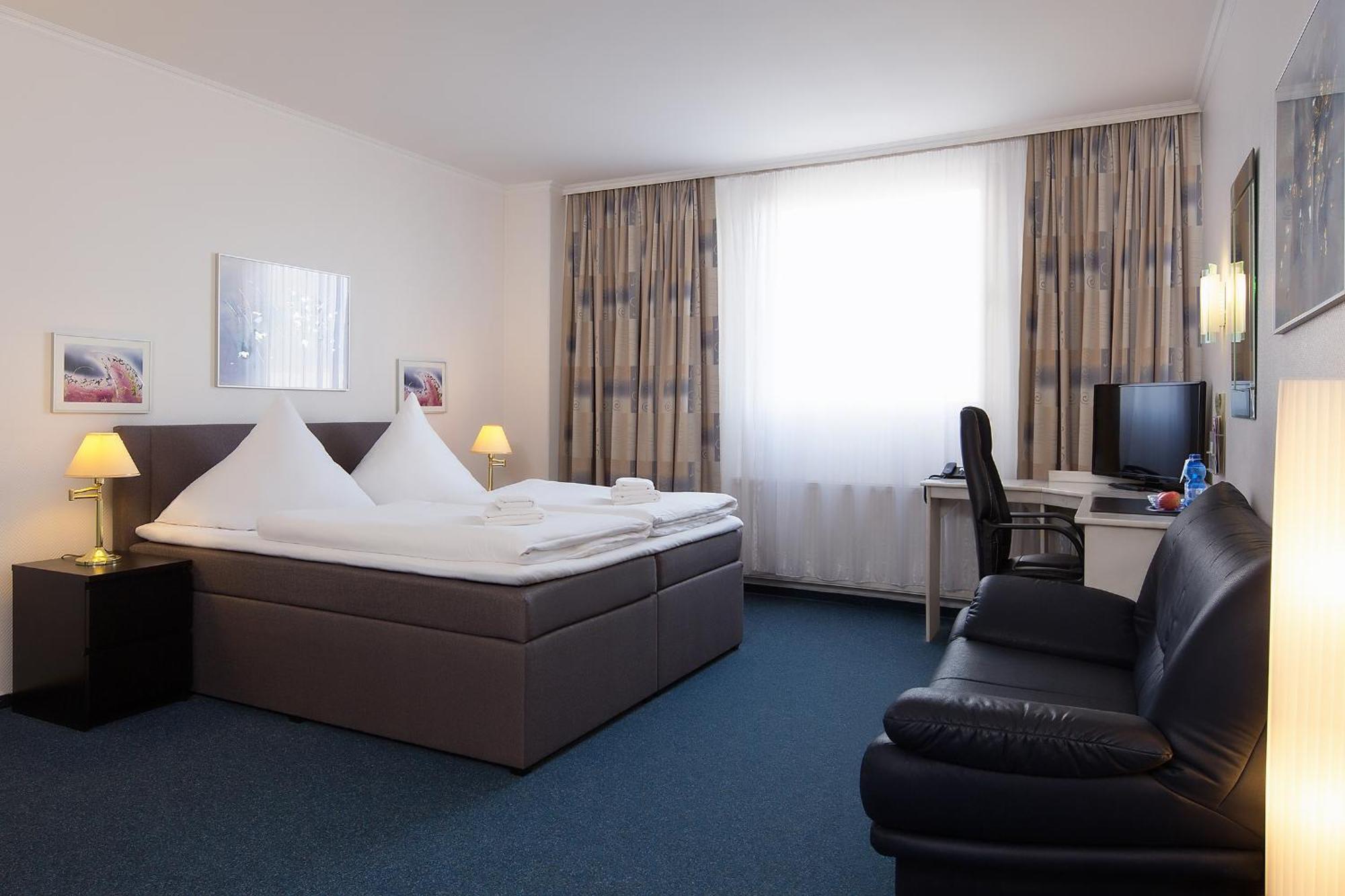 Doppel- oder Zweibettzimmer