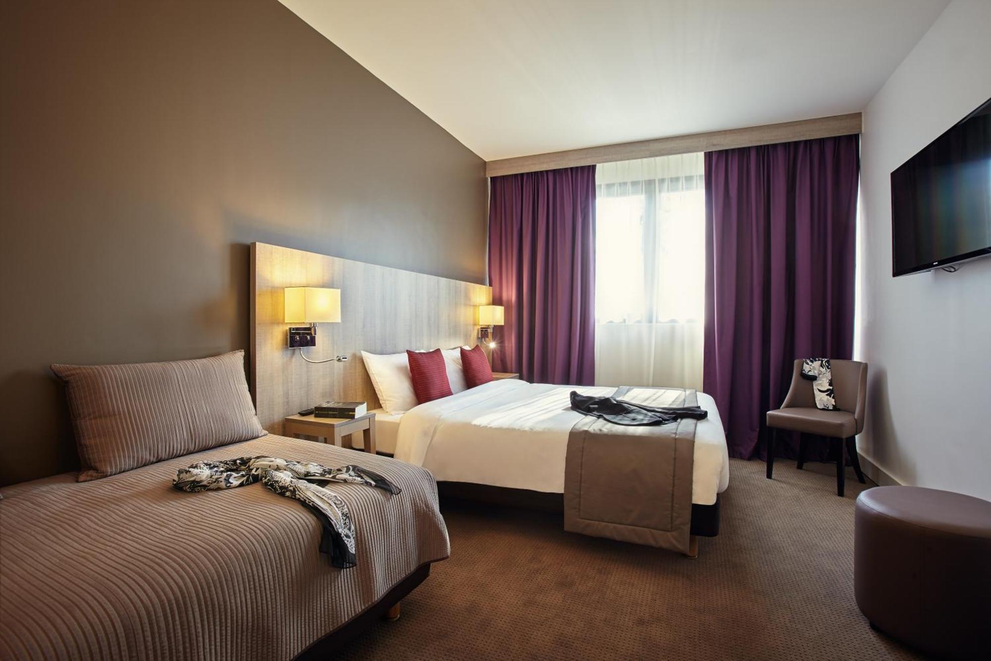 Classic Zimmer mit 1 Doppelbett und 1 Einzelbett