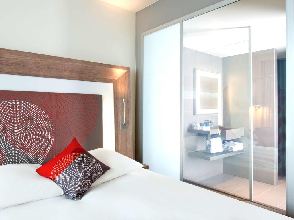 Premium Zimmer mit Queensize-Bett und 2 Einzelschlafsofas