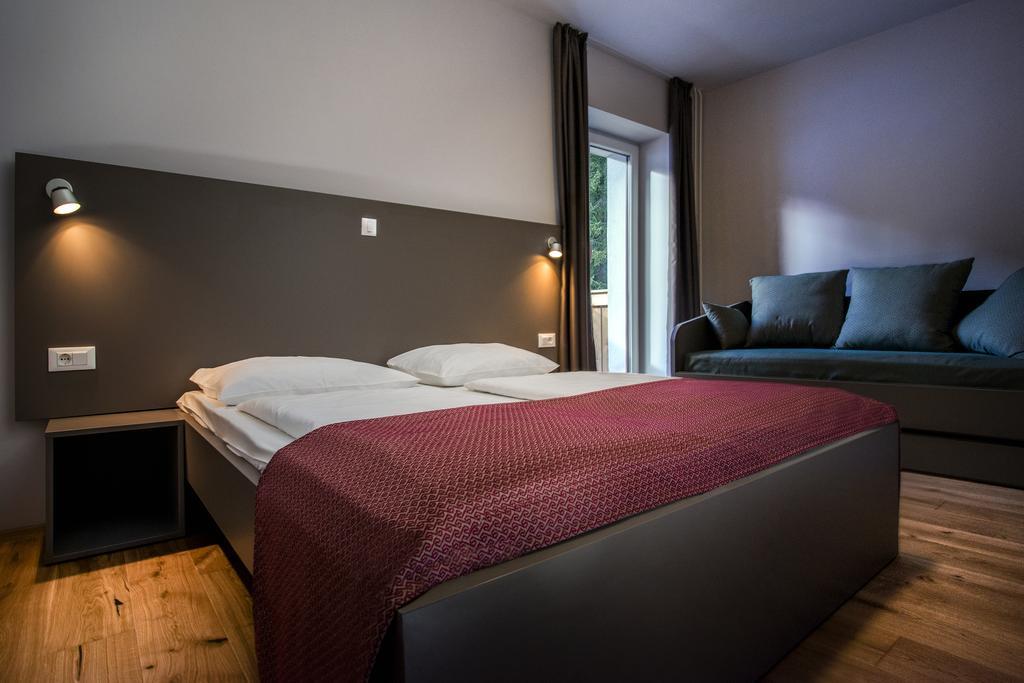 Dreibettzimmer mit Balkon