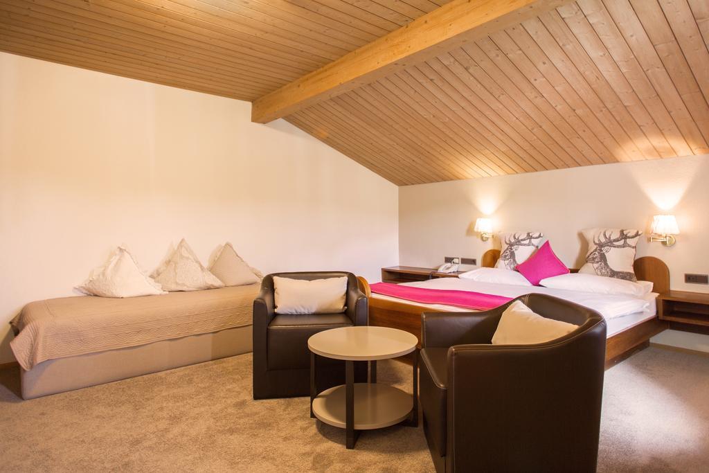 Dreibettzimmer mit Balkon
