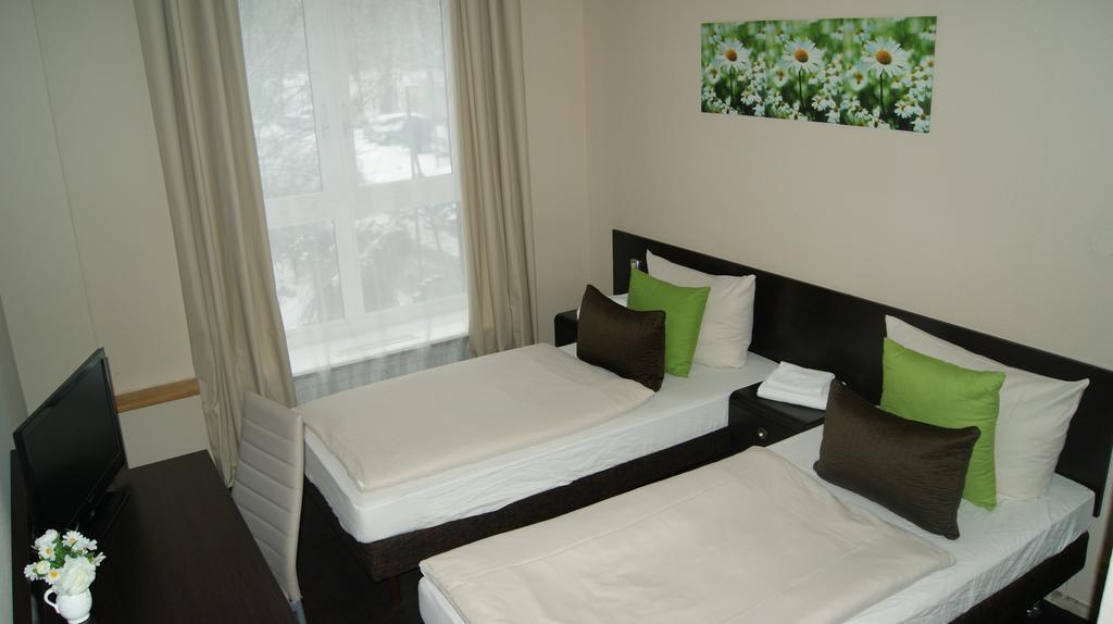 Doppel-/Zweibettzimmer mit Gemeinschaftsbad
