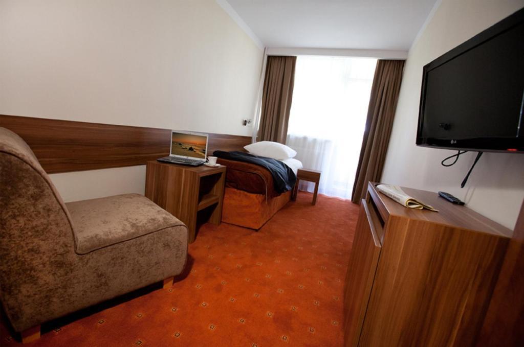 Dreibettzimmer mit Balkon