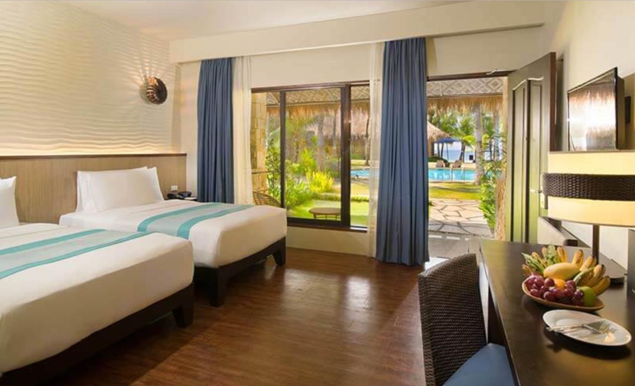 Deluxe Doppel-/Zweibettzimmer mit Poolblick